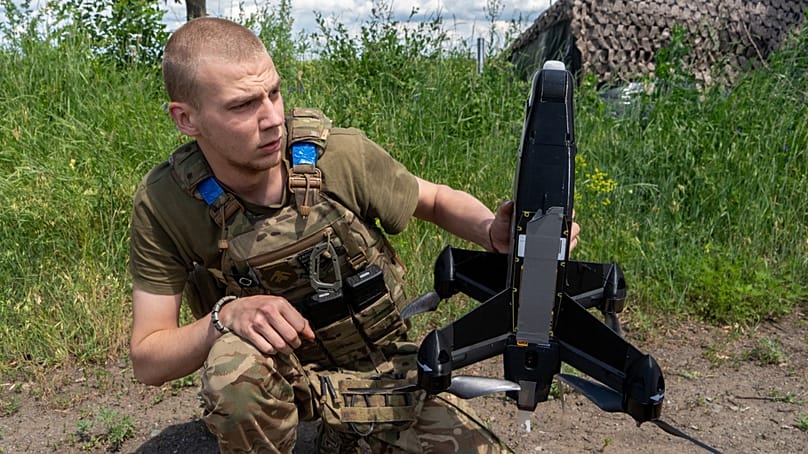 A Ukrainian serviceman of Khartia brigade launches an interceptor drone in Kharkiv region, Ukraine, Friday, June 26, 2026.