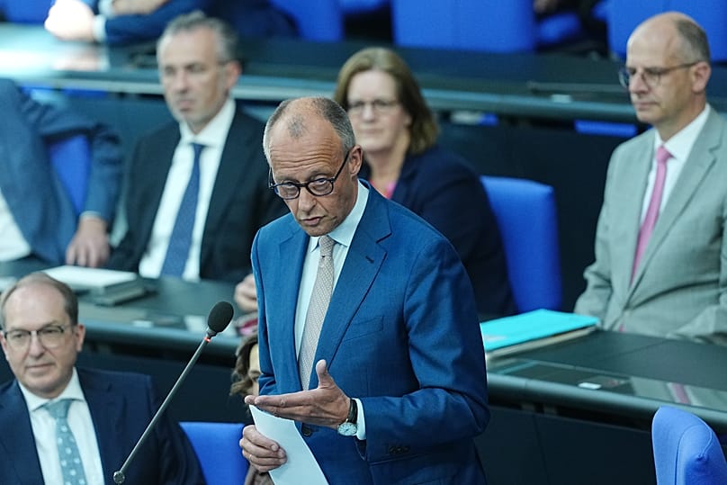 German Chancellor Friedrich Merz speaks in the plenary chamber of the Bundestag during a government statement in Berlin, 11 June, 2026