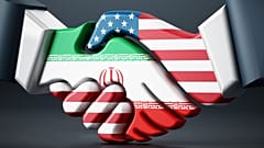 العلمان الأمريكي والإيراني