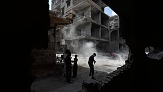 Residents remove rubble from damaged buildings in the al-Hajar al-Aswad neighbourhood on the outskirts of Damascus, 29 April, 2026