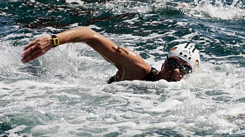 Germany's Angela Maurer swims to the fourth place during the race at the open water swimming world championships in Naples