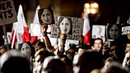 Protesters hold photos of Daphne Caruana Galizia during a protest in Valletta, 29 November, 2019 