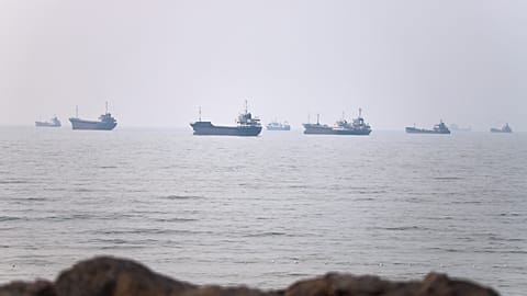 Commercial vessels are seen in the Strait of Hormuz off Bandar Abbas, 30 June 2026