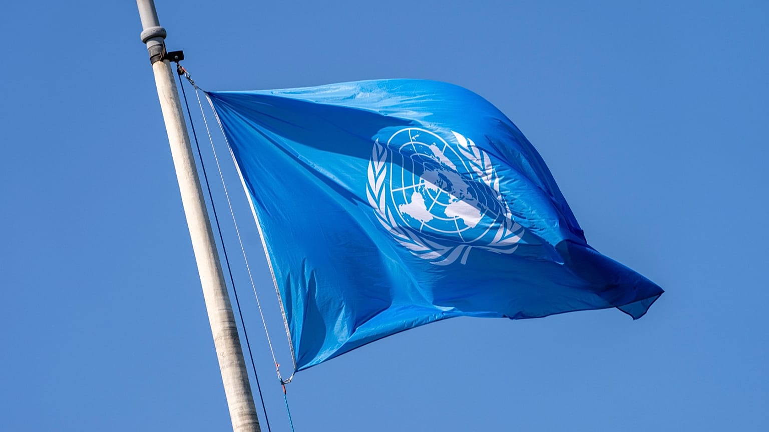 The UN flag waves the International Court of Justice in The Hague, 23 May, 2024