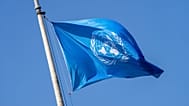 The UN flag waves the International Court of Justice in The Hague, 23 May, 2024
