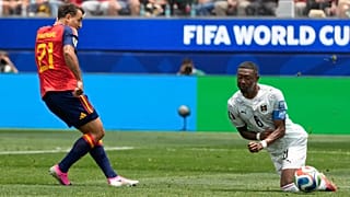 Spain's Mikel Oyarzabal scores the opening goal during a World Cup round of 32 soccer match between Spain and Austria