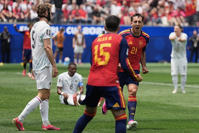 Spain's Mikel Oyarzabal (21) celebrates after scoring his side's opening goal