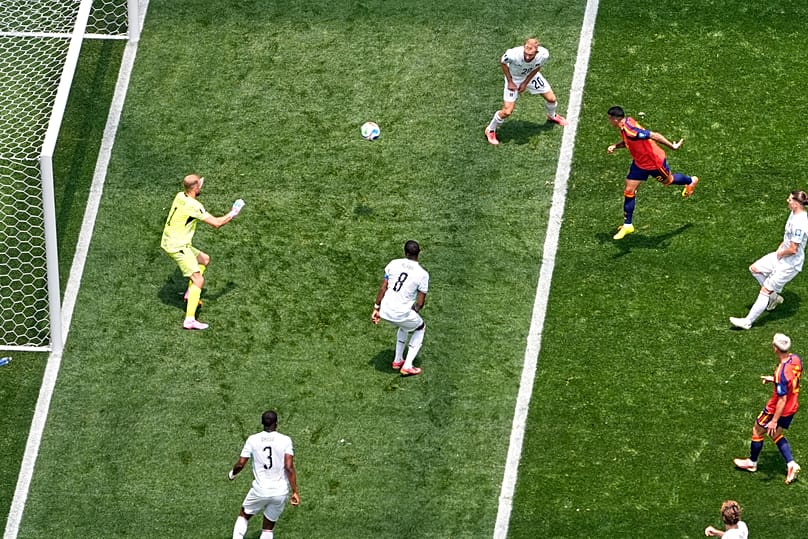 Spain's Pedro Porro (12) scores their second goal during the World Cup round of 32 