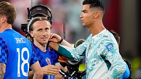 Croatia's Luka Modric (10) and Portugal's Cristiano Ronaldo (7) greet each other after the World Cup round of 32 soccer match between Portugal and Croatia in Toronto.