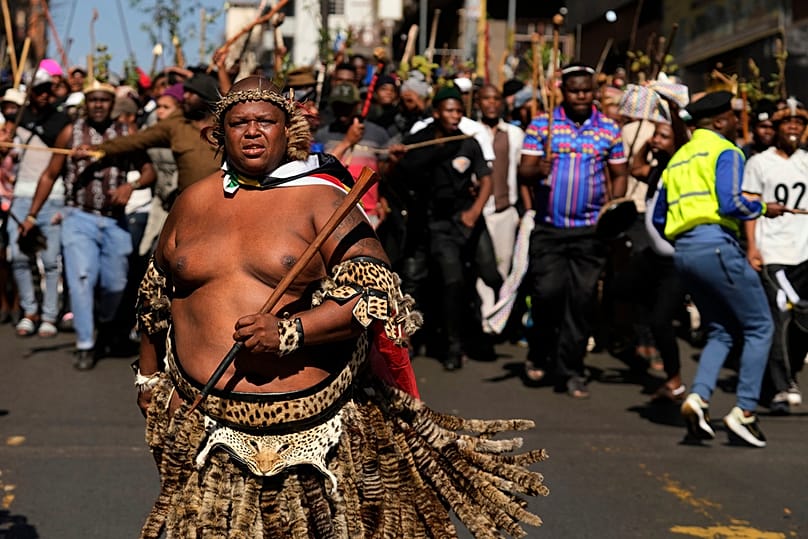 A protester dressed traditional attire march against illegal immigration, in Johannesburg, South Africa, Tuesday, June 30, 2026.