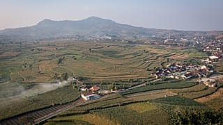 This aerial shot taken using a drone shows a general view of a village in Kendeng Mountains in Rembang, Central Java, Indonesia, Friday, June 19, 2026. (AP Photo/Ibrahim AS)