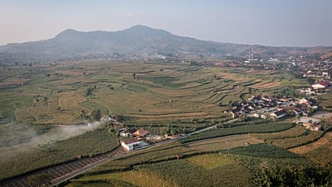 This aerial shot taken using a drone shows a general view of a village in Kendeng Mountains in Rembang, Central Java, Indonesia, Friday, June 19, 2026. (AP Photo/Ibrahim AS)