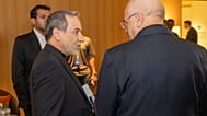 وزير الخارجية الإيراني سيد عباس عراقجي، على اليسار، ورئيس البرلمان الإسلامي الإيراني محمد باقر قاليباف