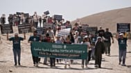 Israeli and international peace activists rally in support of the Bedouin communities of Khan al-Ahmar in the occupied West Bank Friday, June 12, 2026. 