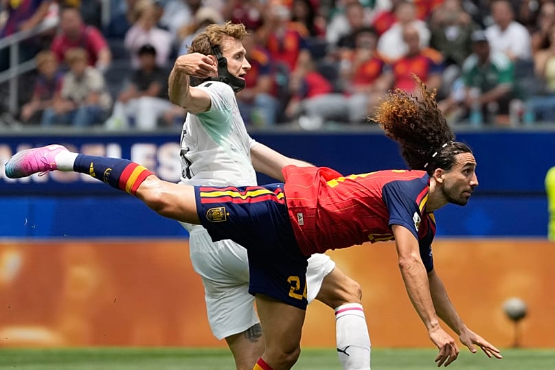 Spain's Marc Cucurella and Austria's Stefan Posch jostle during a World Cup round of 32 soccer match in Inglewood, Calif., near Los Angeles, Thursday, July 2, 2026.