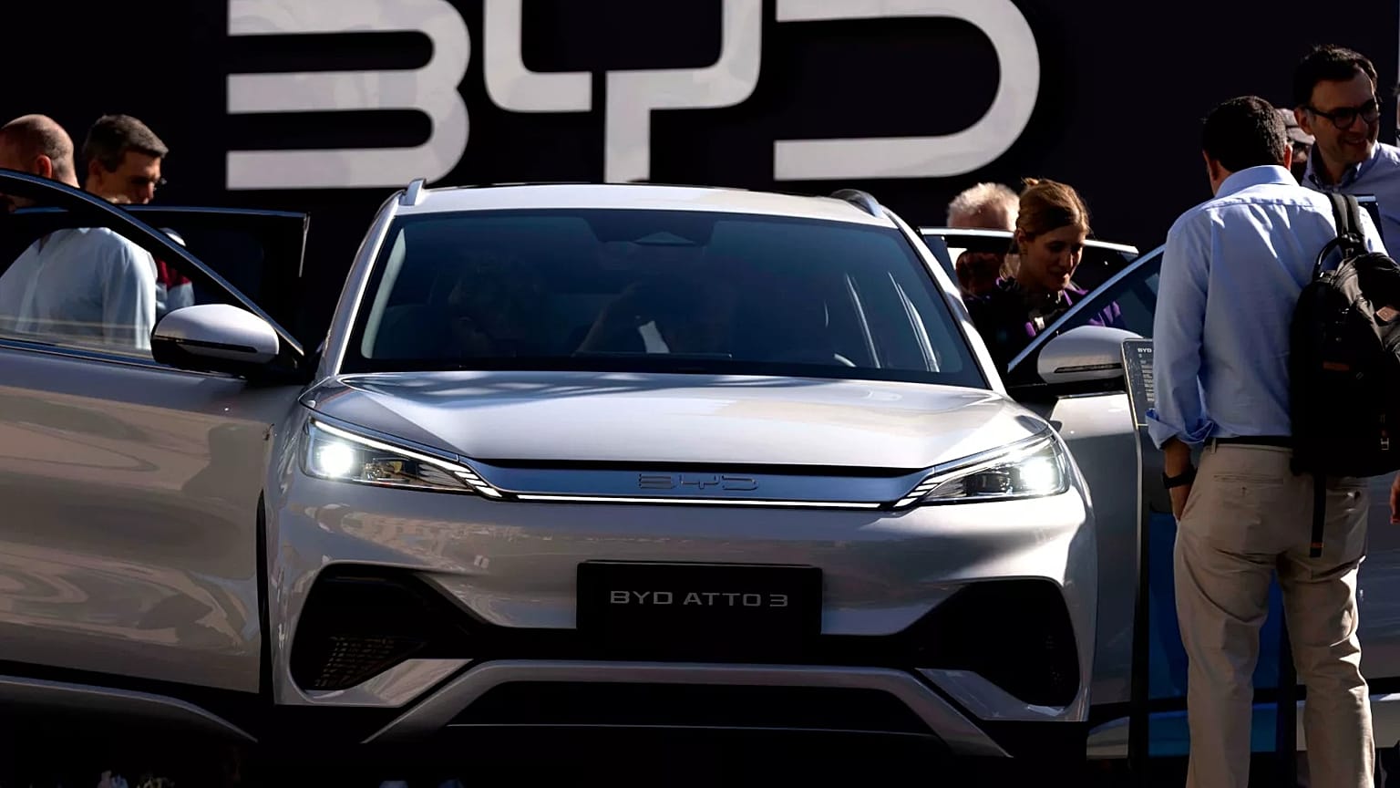 Visitors inspect a China made BYD ATTO 3 at the IAA motor show in Munich, September 2023.