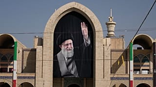 A portrait of the slain Iranian Ayatollah Ali Khamenei hangs at the Imam Khomeini Mosalla Grand Mosque in Tehran, 3 July 2026