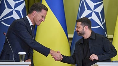 NATO Secretary General Mark Rutte, left, shakes hands with Ukrainian President Volodymyr Zelenskyy during a briefing in Kyiv, August 2025.