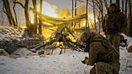 Ukrainian soldiers fire at Russian positions on the front line in the Kharkiv region, 18 February, 2026