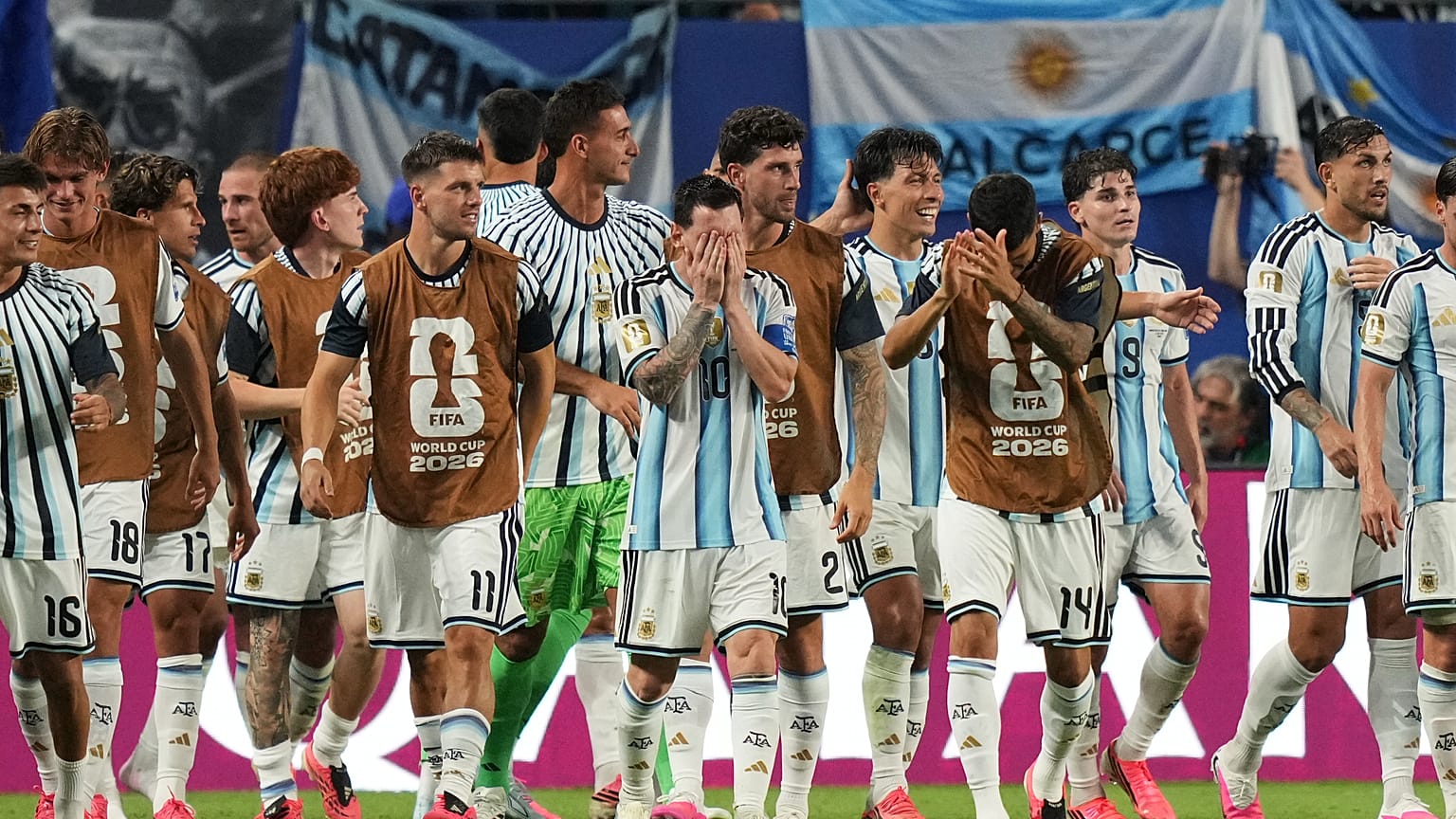 Argentina's Lionel Messi (10) and his teammates react after Cape Verde's Diney Borges (3) scored an own goal during the World Cup round of 32 soccer match in Miami Gardens.