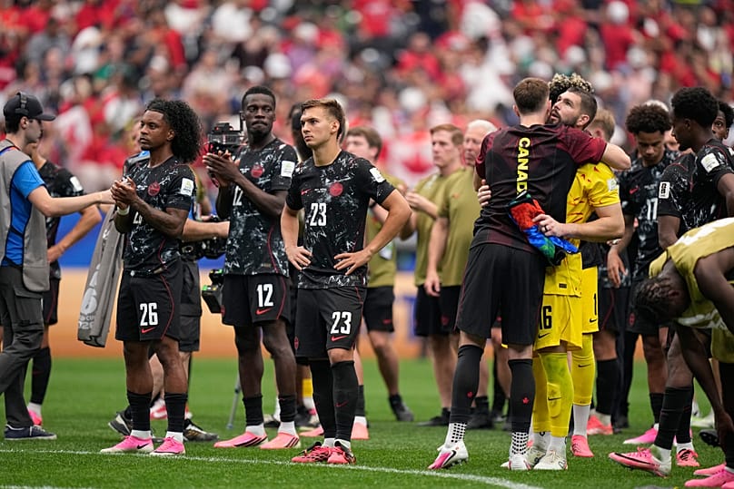 Canada's players react after the World Cup round of 16 soccer match between Canada and Morocco in Houston, Saturday, July 4, 2026. 