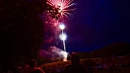 Hundreds of people gather at Living Memorial Park to watch the Fourth of July fireworks display during Brattleboro's America 250 celebration as part of Brattleboro, Vt.