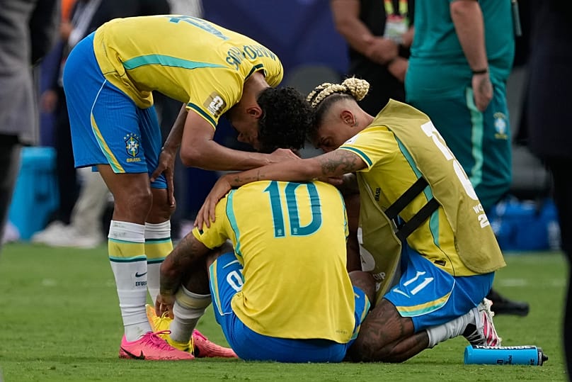 Brazil's Marquinhos, Neymar (10) and Raphinha react after losing to Norway the World Cup round of 16 soccer match in East Rutherford, Sunday, July 5, 2026. 