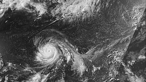 This satellite image from the National Oceanic and Atmospheric Administration shows Typhoon Bavi nearing the U.S. Pacific island territory of Guam on Sunday, July 5, 2026. 