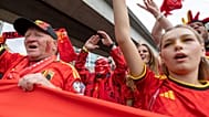 Belgium fans march toward B.C. Place prior to a World Cup Group G soccer match against New Zealand,