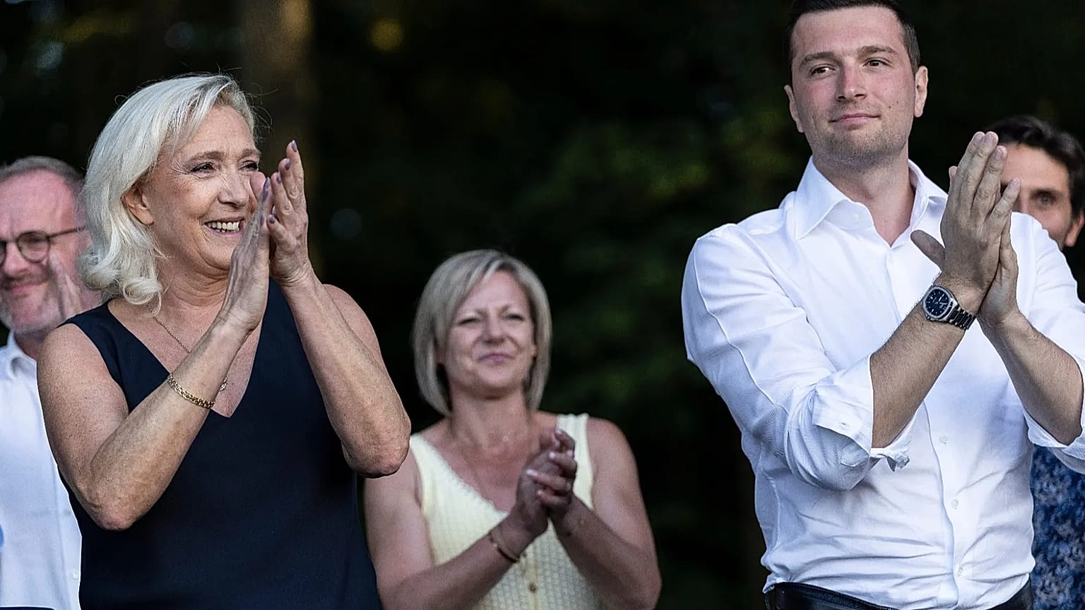 Far-right party National Rally president Jordan Bardella and far-right leader Marine Le Pen attend a rally in Lievin, northern France, 4 July 2026.