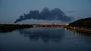 File - Smoke rises over the city center after a Russian attack on Kyiv, Ukraine, Thursday, 25 June 2026.