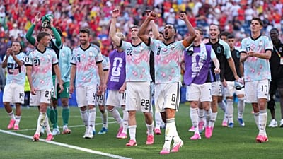 Belgium players celebrate after they won a World Cup round of 16 soccer match against the United States in Seattle, M...