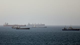 Tankers and cargo vessels are seen in the Gulf of Oman, along shipping routes linking the Strait of Hormuz and the Arabian Sea, Tuesday, June 16, 2026. 