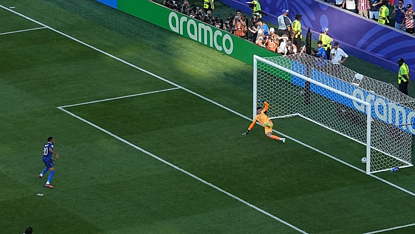 France's Kylian Mbappe scores the opening goal from the penalty spot against Paraguay during the World Cup round of 16 soccer match in Philadelphia, Saturday, July 4, 2026.
