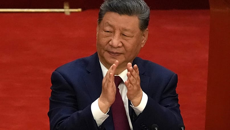 Chinese President Xi Jinping applauds during a ceremony at the Great Hall of the People in Beijing, 1 July, 2026