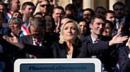 French far-right leader Marine Le Pen delivers a speech during a rally near the parliament in Paris, 6 April, 2025