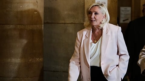 Far-right leader Marine Le Pen arrives at the courtroom for the verdict of her appeals trial in Paris, 7 July, 2026