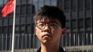 Pro-democracy activist Joshua Wong stands outside the Legislative Council building in Hong Kong, 28 November, 2019