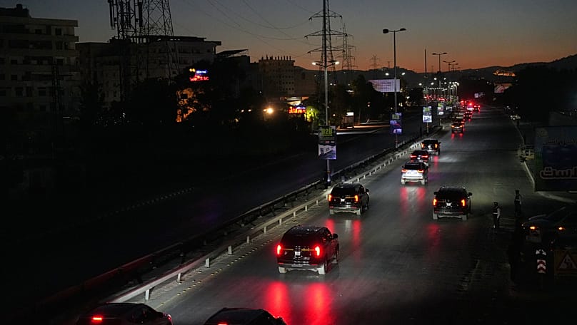 The convoy of French President Emmanuel Macron enters Damascus after arriving in Syria, 6 July, 2026