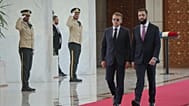 Syrian President Ahmad al-Sharaa, right, meets French President Emmanuel Macron at the presidential palace in Damascus, Syria, Tuesday, July 7, 2026.