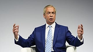 Reform UK leader Nigel Farage gestures during a fireside chat at the Alliance for Responsible Citizenship (Arc) annual conference, at Olympia London, Wednesday June 24, 2026.