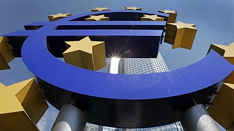 The sun is reflected by the European Central Bank ECB Tower through the logo of the ECB in Frankfurt, central Germany, on Thursday, Aug. 6, 2009. 
