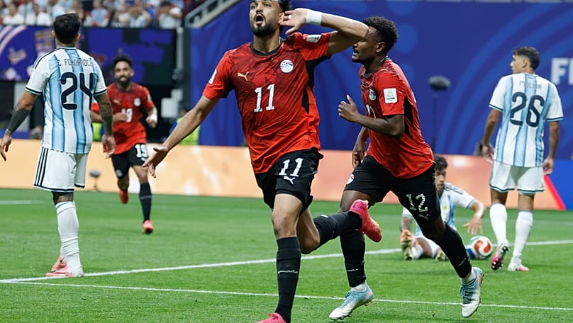 Mostafa Zico (11), of Egypt, celebrates his team’s opening goal during the World Cup round-of-16 match between Argentina and Egypt