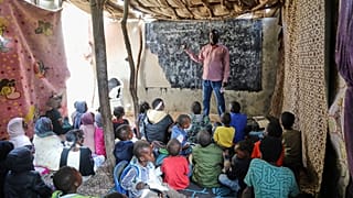 Refugee teacher fights to keep education alive for children displaced by Sudan's war