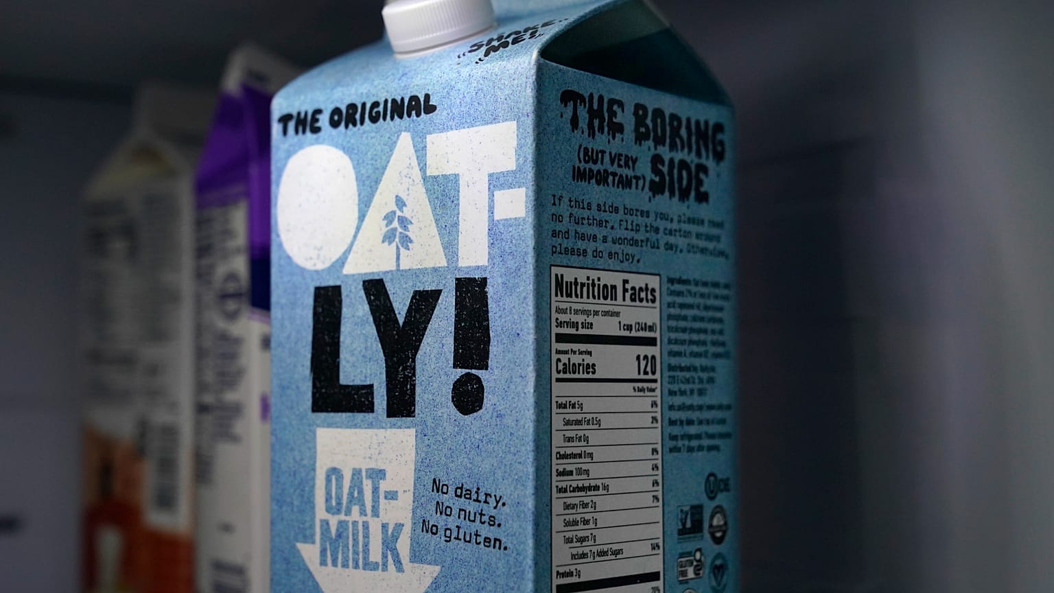 A carton of Oatly oat milk sits in a home refrigerator Tuesday, May 18, 2021, in Bellingham, Wash. Oatly, the world’s largest oat milk company