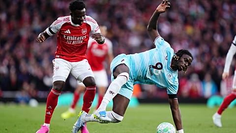 Arsenal's Bukayo Saka and Burnley's Lesley Ugochukwu battle for the ball, 18 May 2026