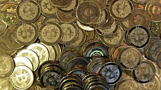 This April 3, 2013 file photo shows bitcoin tokens at a shop in Sandy, Utah.