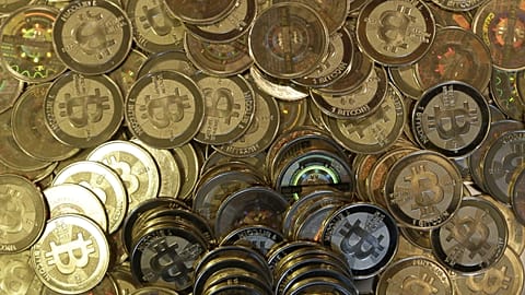 This April 3, 2013 file photo shows bitcoin tokens at a shop in Sandy, Utah.