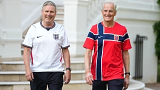 Britain's Prime Minister Keir Starmer, left, and Norway's Prime Minister Jonas Gahr Store wear team soccer jerseys as they walk prior to a meeting at the British Embassy