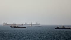 Tankers and cargo vessels are seen in the Gulf of Oman, 16 June, 2026